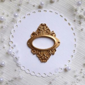 Фігурна рамка овальна, гіпс, античне золото, 5,5*6,5 см.
