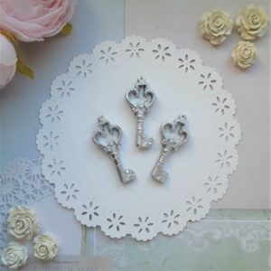 Ключик гіпсовий, сріблястий, 4*1,7 см, 1 штука.